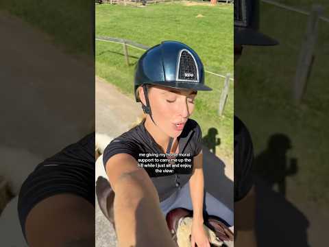 Me giving my horse moral support to carry me up the hill while I sit and enjoy the view: #equestrian