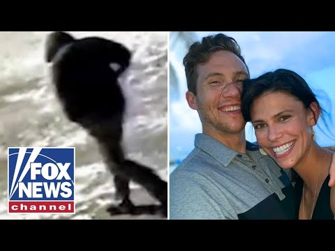 CHILLING video shows person of interest in double murder case