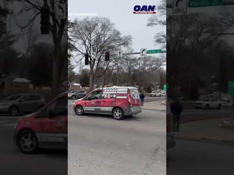 Two cars fall into a sinkhole at an intersection in Omaha