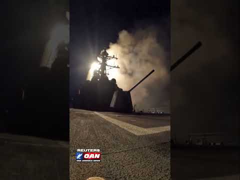 The U.S. Department of War shows missiles being fired from USS Bainbridge.