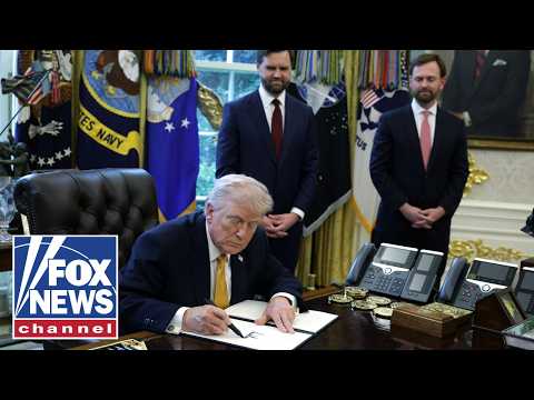 WATCH: Trump signs executive order from the Oval Office