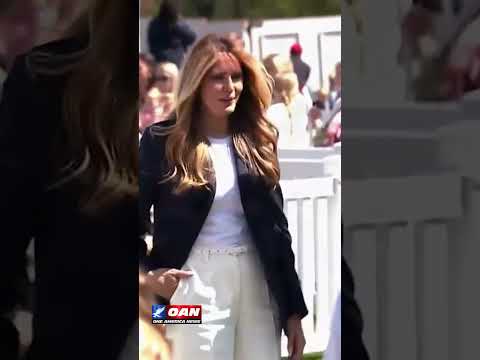 First Lady Melania Trump enjoys watching the festivities at the 2026 White House Easter Egg Roll.