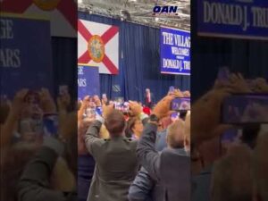 Crowd chants “USA” as President Trump enters the stage at the “Golden Age for Your Golden Years”