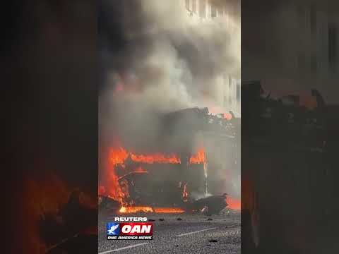 Protesters set bus on fire following Belfast knife attack