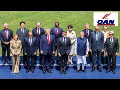 President Trump poses for a photo with world leaders at the G7 summit in Evian, France