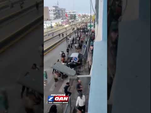 Eyewitness video shows people running through the Beni Ansar border-crossing complex