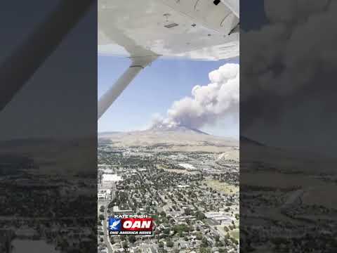 A fast-moving brush fire near Reno, Nevada, has grown to more than 10,500 acres