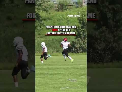 SEE IT: Parent RUNS ONTO field and TRIPS 9-year-old football player mid-game #foxnews #News #shorts